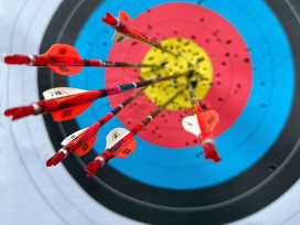 Six arrows in the gold ring, a maximum combined score of sixty.