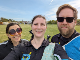 Our three participants enjoying the sunny field.